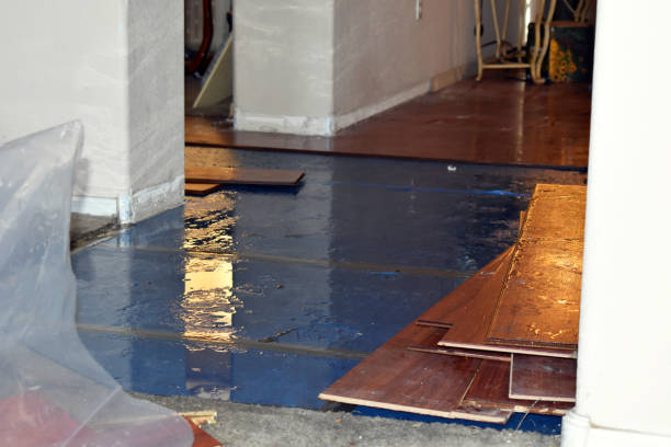 Professional Basement Flood Cleanup technician working in Chouteau, OK